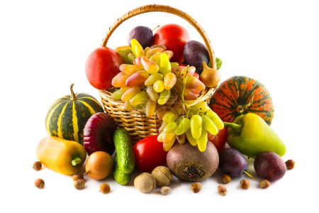 Set of vegetables and fruits in a basket isolated on a white background.
