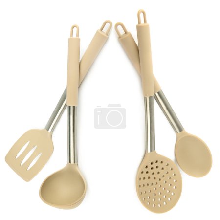 Kitchen spoon, ladle, spatula, skimmer isolated on white background. There is free space for text. Collage.