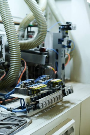 Foto de Close-up of machine equipment with indicators and wires in factory - Imagen libre de derechos