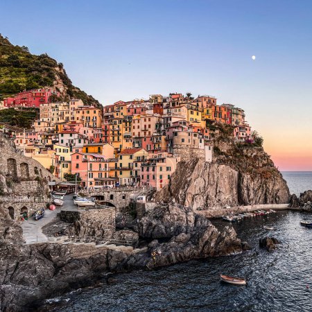 Photo for Manarola, Italy - July 2022: Manarola, one of the five Cinque Terre. This traditional fishing village is a travel attractions. Spezia, Liguria, Italy, Europe - Royalty Free Image
