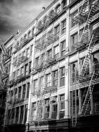 Photo for Old buildings with fire ladder on New-york manhattan, Upper East Side, facade buildings - Royalty Free Image