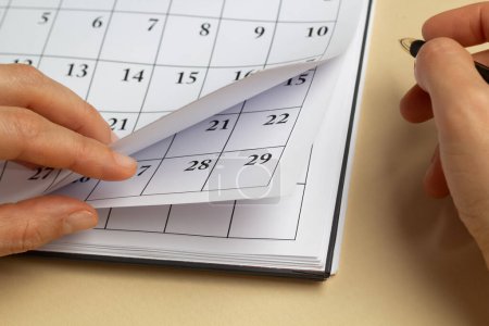 Photo for Close-up of calendar days pages. The concept of planning and deadline. - Royalty Free Image