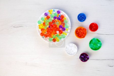 Colored balls of hydrogel, kids game, education concept.