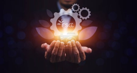Foto de ESG pantalla visual en mano.ESG gobernanza social ambiental estrategia empresarial concepto de inversión. - Imagen libre de derechos