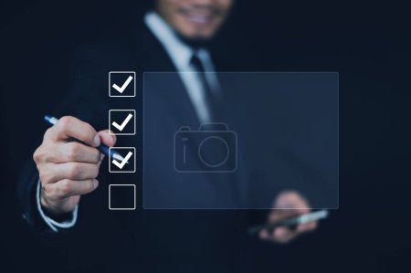 Photo for Businessman touch on digital screen check correct sign mark in checkbox for quality document control checklist for business approve. - Royalty Free Image