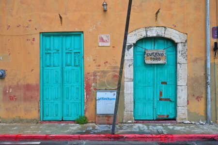 Photo for Merida, Mexico - July 20, 2023: Colorful colonial style buildings at street of Merida city old town, Mexico - Royalty Free Image