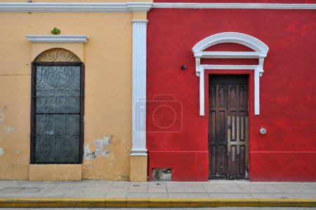 Colorful colonial style buildings at street of Merida city old town, Yucatan, Mexico