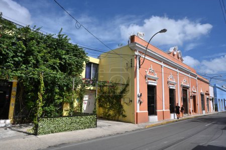 Photo for Merida, Mexico - July 21, 2023: Colorful colonial style buildings at street of Merida city old town, Yucatan, Mexico - Royalty Free Image