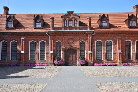 Photo for Raudondvaris, Lithuania - September 08, 2023: Architecture of Raudondvaris Manor, Gothic-Renaissance gentry residence in Raudondvaris, Lithuania. - Royalty Free Image
