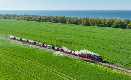 Aerial view of historical steam train Molli near Heiligendamm, Germany