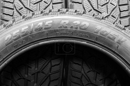 Photo for Tire side view with indication of tire width and height, wheel diameter, speed and load limit codes, tubeless tyre, M plus S and 3PMSF marking - Royalty Free Image