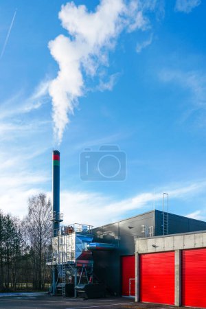 New modern wood chip biofuel boiler house for increased heat energy production efficiency from renewable energy resources, modern heat power plant