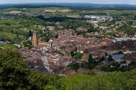 Téléchargez les photos : The city of Arbois in the Jura with the church Saint-Just d'Arbois in France. - en image libre de droit