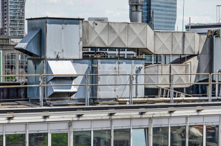 Photo for Front view of ducts and other ventialtion machinery on the roof of an office building - Royalty Free Image