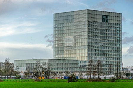 Photo for Utrecht, The Netherlands, March 24, 2023: view across the fields towards the new building of RIVM (National Institute for Health and the Environment) at the science park - Royalty Free Image