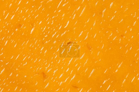 Photo for Melting cheddar cheese closeup texture - Royalty Free Image