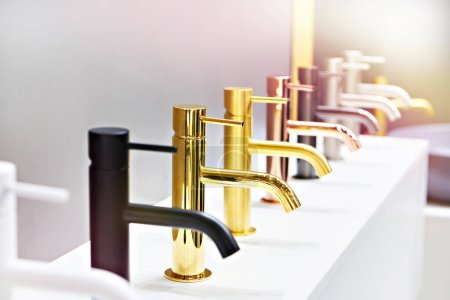 Plumbing and kitchen faucets at exhibition in store