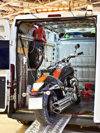 Motorcycle cruiser in car tow truck for transportation