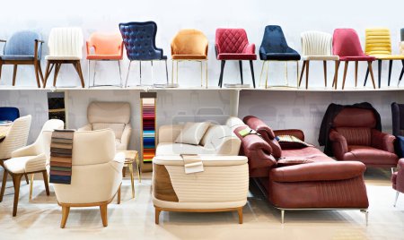 Chairs and sofas in the furniture store