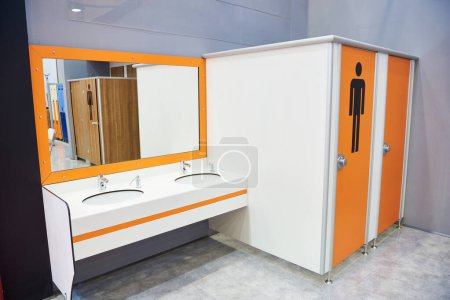 Public toilet cubicle and wash basins at the exhibition