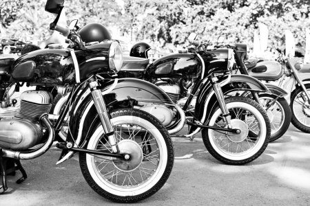 Vintage old motorcycles in retro style black white