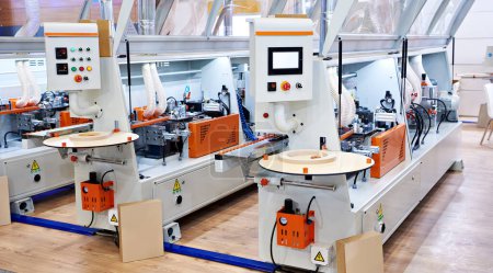 Single sided automatic edge banders on factory