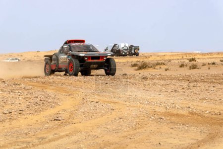 Photo for Al-Kharj, Saudi Arabia - January 10, 2023: A RS Q E-TRON E2 racing car from Team Audi Sport running Stage 9 of rally Dakar 2023 edition - Royalty Free Image
