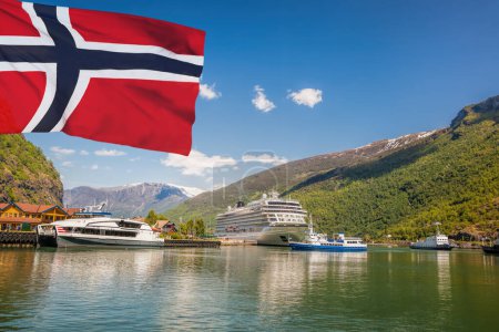 Photo for Port of Flam with luxury cruise ship against flag of Norway. - Royalty Free Image