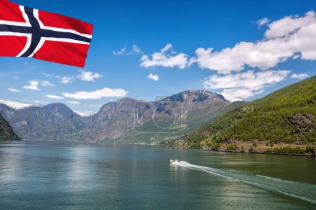 Photo for Port of Flam with tourist boat in the fjord with flag of Norway - Royalty Free Image