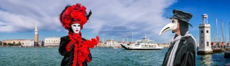 Foto de Colorful carnival masks with famous Plague Doctor at a traditional festival in Venice, Italy - Imagen libre de derechos