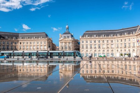 Photo for Reflection of Place De La Bourse and tramway in Bordeaux, France. Unesco World Heritage Site - Royalty Free Image