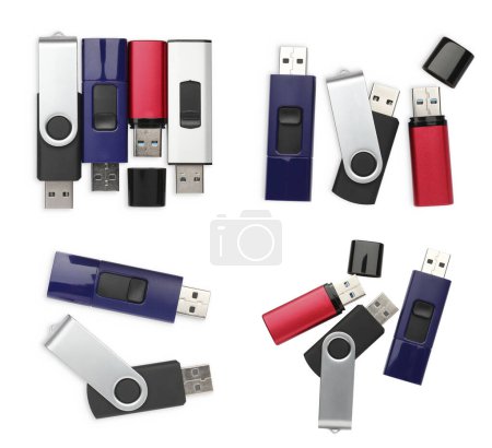 Foto de Set con modernas unidades flash USB sobre fondo blanco, vista superior - Imagen libre de derechos