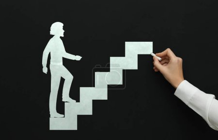 Photo for Woman drawing person going up stairs on chalkboard, closeup. Steps to success - Royalty Free Image