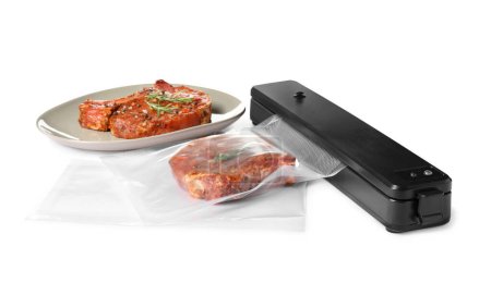 Sealer for vacuum packing and plastic bag with tasty meat, rosemary on white background