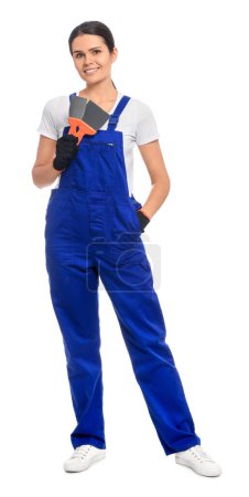 Photo for Professional worker with putty knives on white background - Royalty Free Image