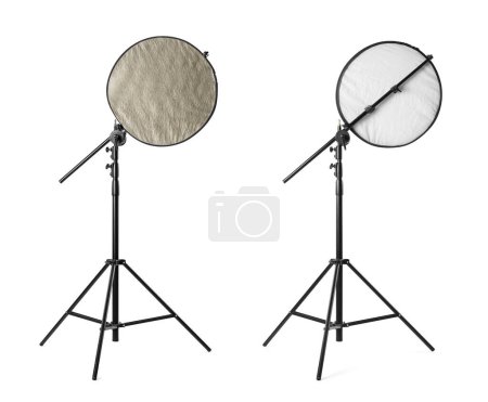 Photo for Tripods with reflectors on white background. Professional photographer's equipment - Royalty Free Image