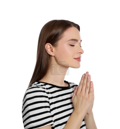 Foto de Mujer con las manos apretadas rezando sobre fondo blanco - Imagen libre de derechos