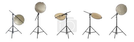 Photo for Set of tripods with reflectors on white background, banner design. Professional photographer's equipment - Royalty Free Image