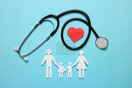 Photo for Paper family figures, red heart and stethoscope on light blue background, flat lay. Insurance concept - Royalty Free Image