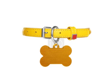 Photo for Yellow leather dog collar with bone shaped tag isolated on white - Royalty Free Image