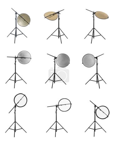 Photo for Set of tripods with different reflectors on white background. Professional photographer's equipment - Royalty Free Image