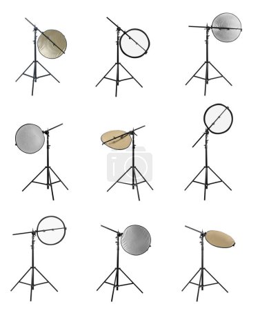 Photo for Set of tripods with different reflectors on white background. Professional photographer's equipment - Royalty Free Image