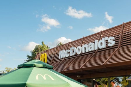 Photo for WARSAW, POLAND - SEPTEMBER 16, 2022: Signboard with McDonald's Restaurant logo outdoors - Royalty Free Image
