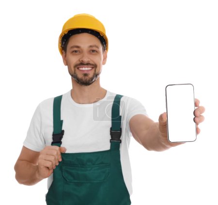 Photo for Professional repairman in uniform with phone on white background - Royalty Free Image