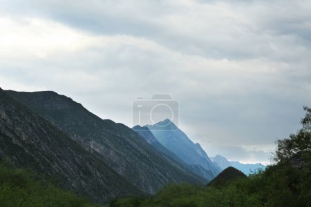 Photo for Picturesque landscape with high mountains under gloomy sky outdoors - Royalty Free Image