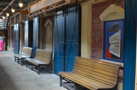 Photo for Utrecht, Netherlands - July 23, 2022: Spoorwegmuseum. Location with wooden benches at railway station - Royalty Free Image