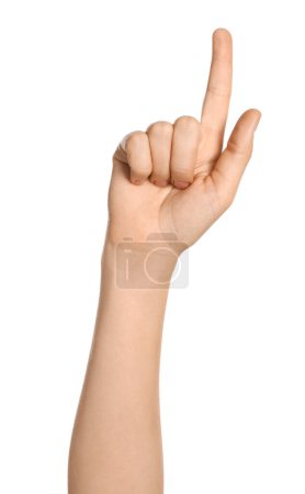 Téléchargez les photos : Femme pointant quelque chose sur fond blanc, gros plan de la main - en image libre de droit