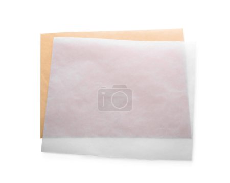 Téléchargez les photos : Feuilles de papier cuisson sur fond blanc, vue de dessus - en image libre de droit