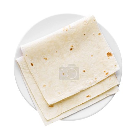 Plate with delicious Armenian lavash on white background, top view