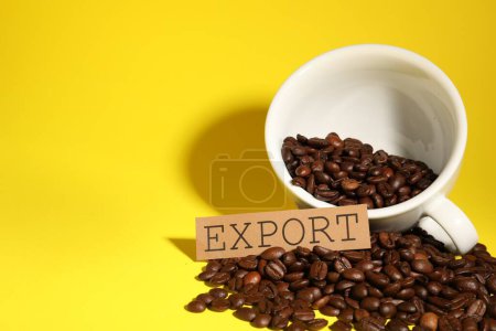 Photo for Coffee beans, white cup and card with word Export on yellow background, space for text - Royalty Free Image